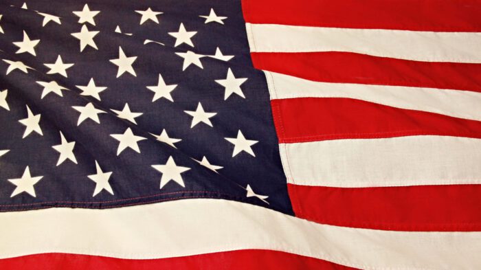 Photo by Sharefaith: https://www.pexels.com/photo/flag-of-america-1202723/