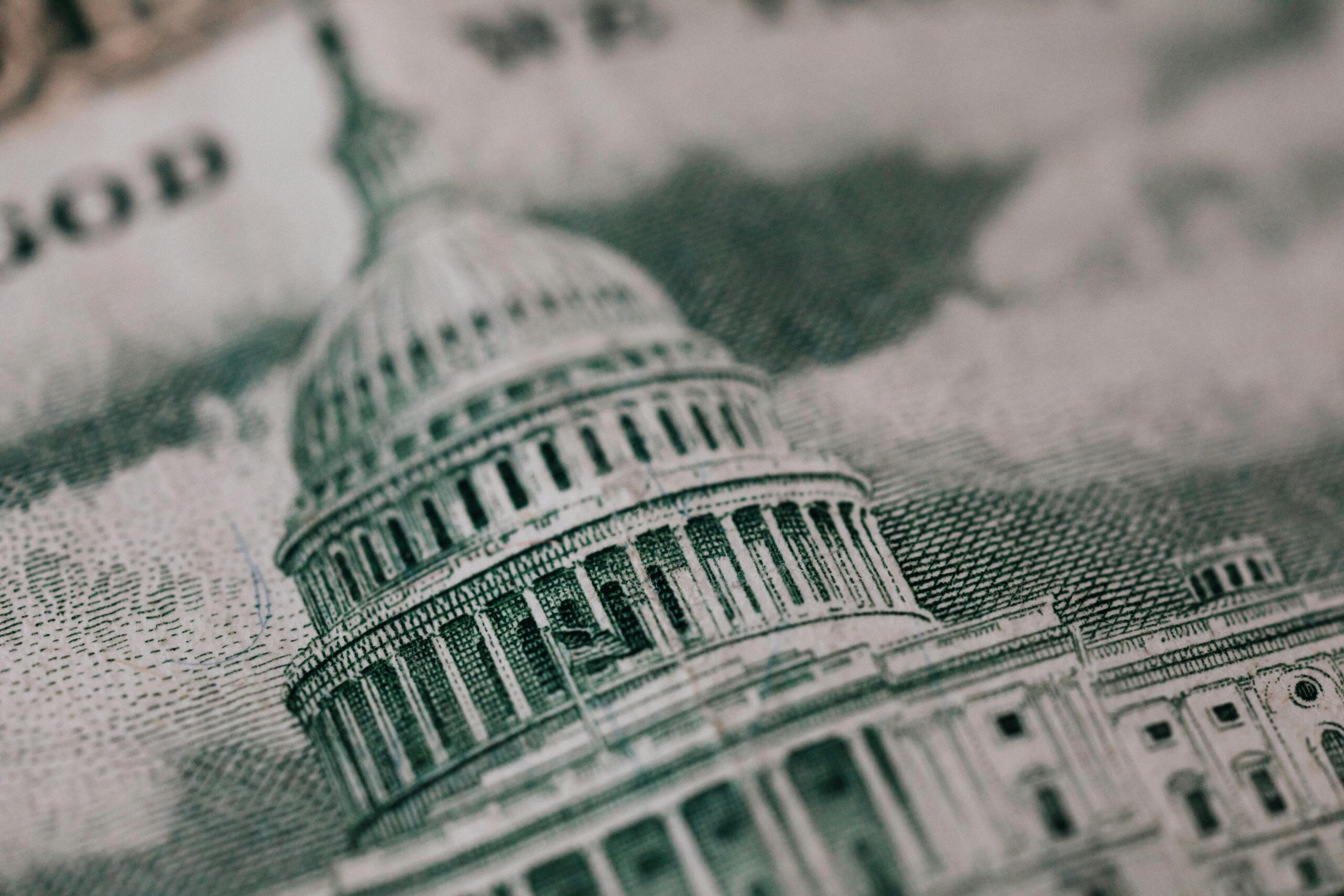 Photo by Photo By: Kaboompics.com from Pexels: https://www.pexels.com/photo/image-of-old-building-on-american-banknote-4386157/